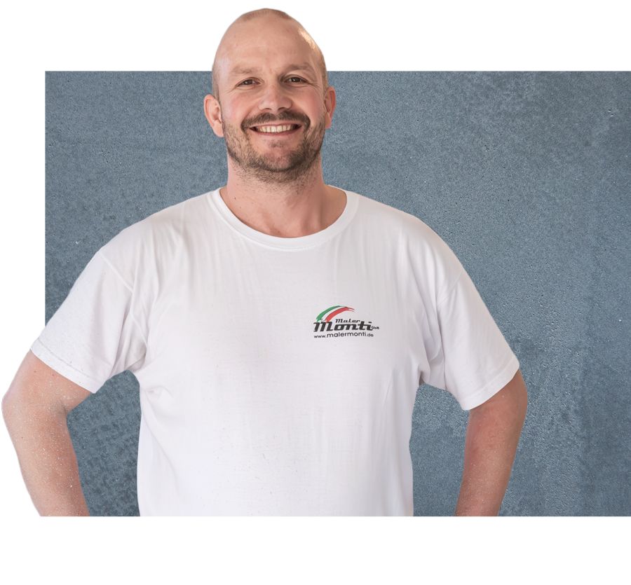 Mitarbeiter der Firma Monti in Arbeitskleidung mit dem Aufdruck Maler Monti